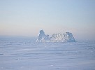 Iceberg frozen in ice