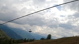 Zipline rider at La Colmaine